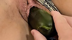 Cucumber in pussy and ass