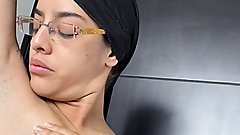 Arab playing with her hairy armpits and shaking her small tits