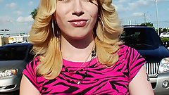 Blond girl with blue frog picked up from street