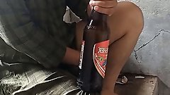 Desi local rendi outdoor drinking beer pissing beer bottle